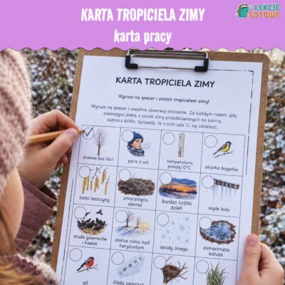 dziecko na spacerze z kartą tropiciela zimy